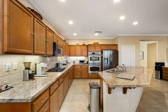 a view of a backyard with sitting area and furniture
