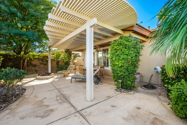 a view of a livingroom with furniture and a window