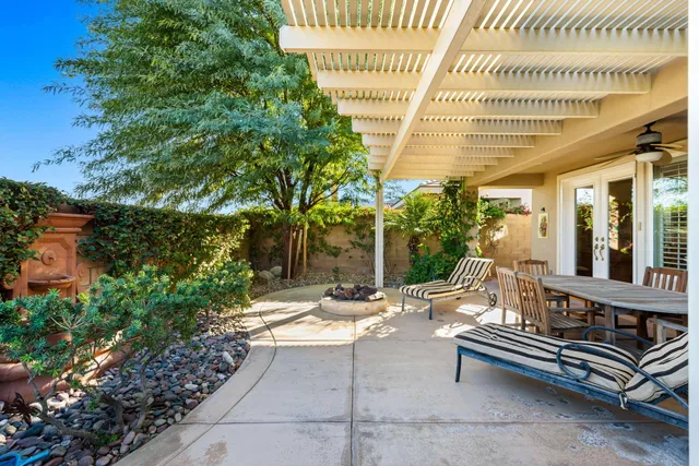 a room with a sink a washer and dryer