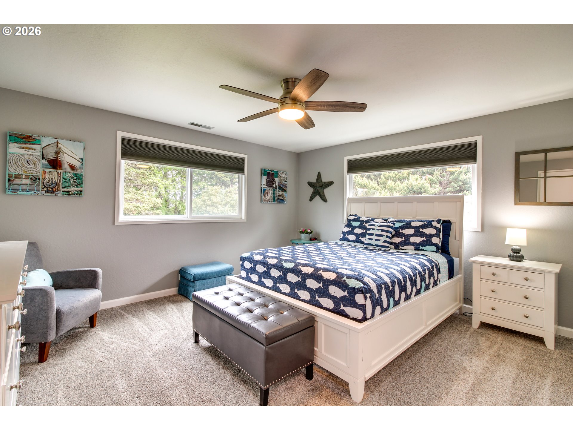 3085 Beach Loop Drive Southwest Bandon, OR 97411 - Photo 23 of 46 a bedroom with a bed rug and window