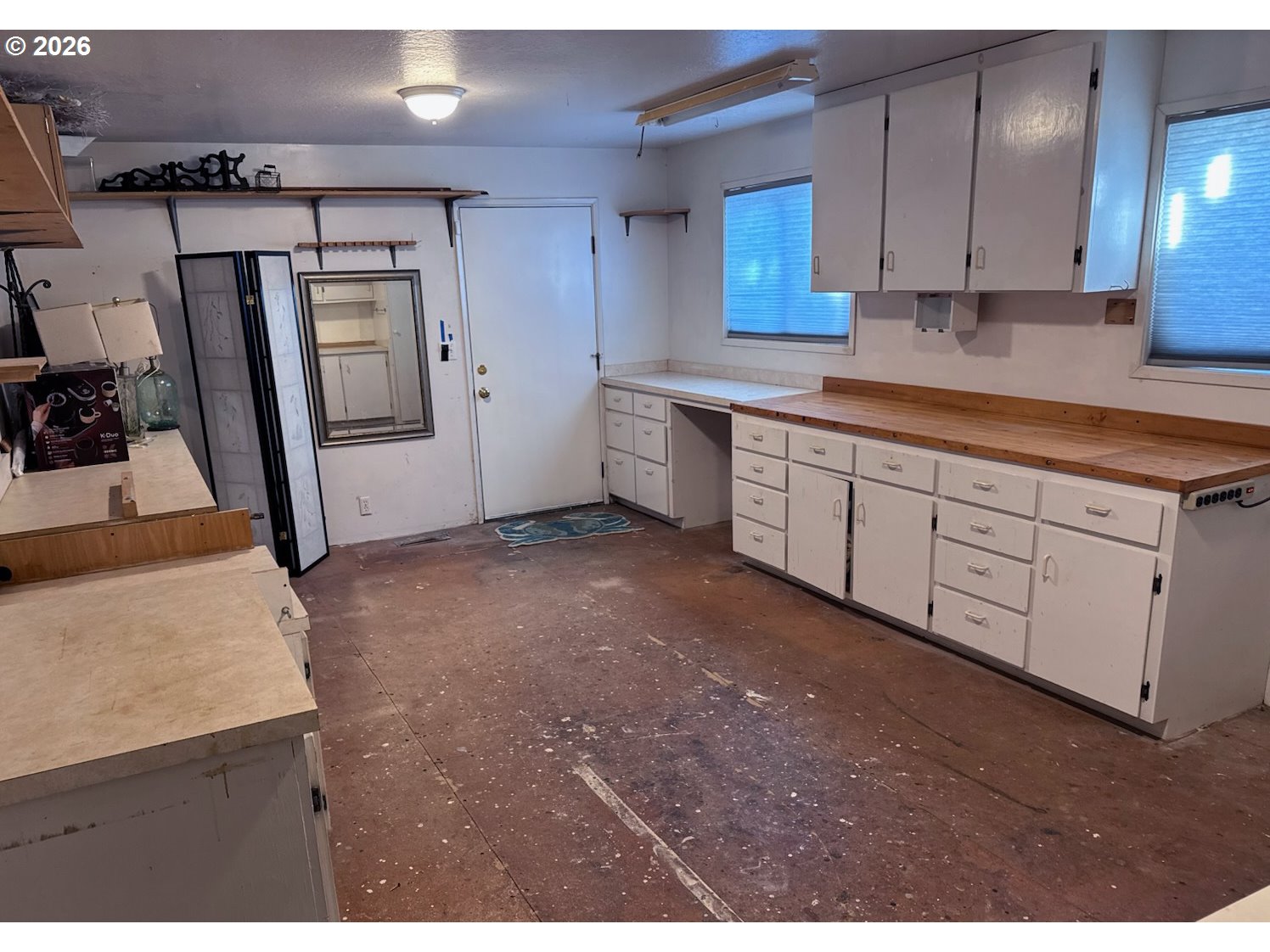 3085 Beach Loop Drive Southwest Bandon, OR 97411 - Photo 40 of 46 a kitchen with sink and cabinets