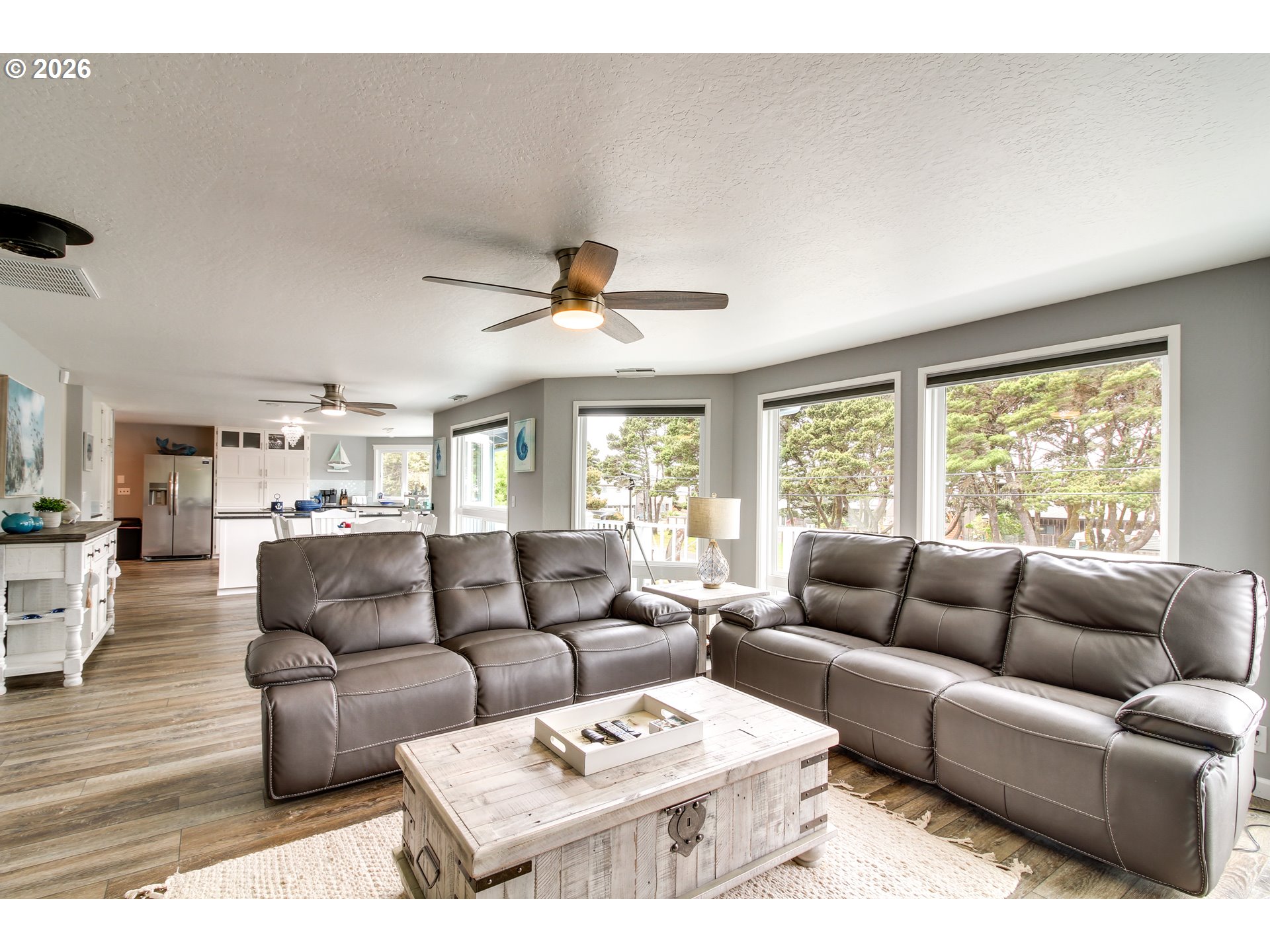 3085 Beach Loop Drive Southwest Bandon, OR 97411 - Photo 7 of 46 a living room with furniture and a large window