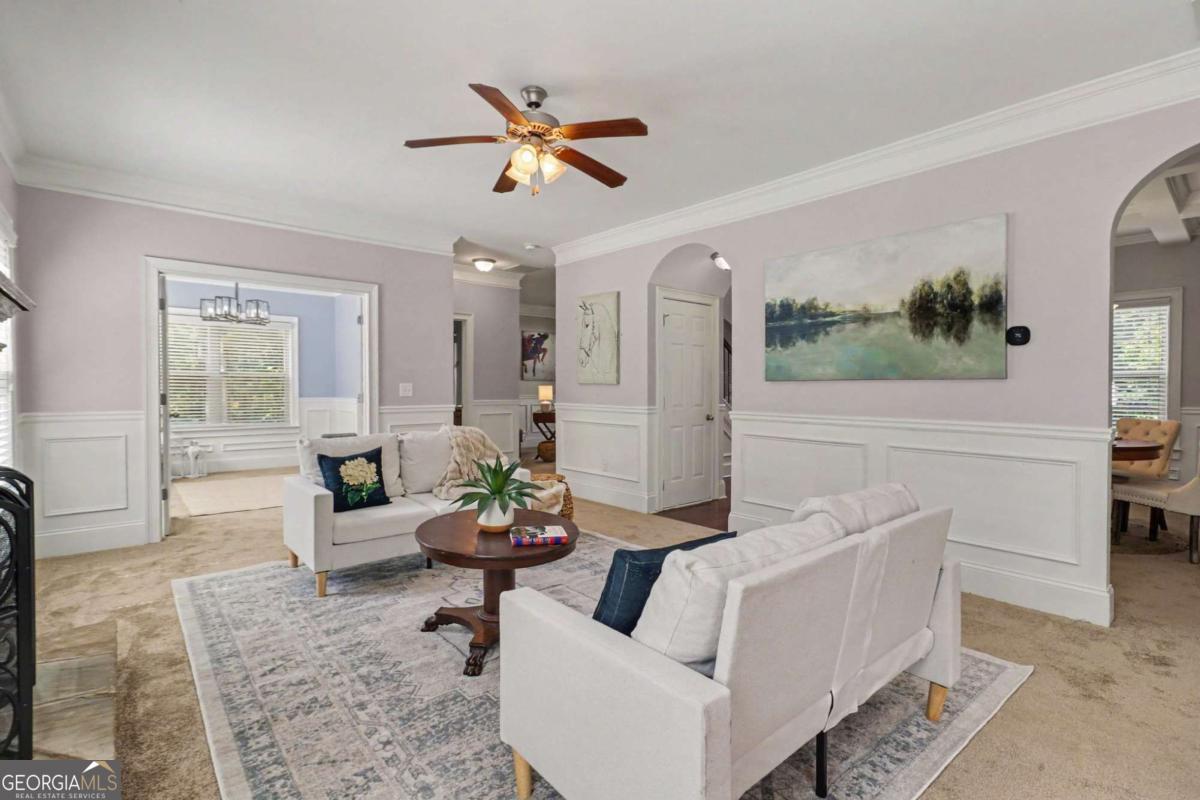 207 George Wynn Road Palmetto, GA 30268 - Photo 5 of 32 a living room with furniture and a large window