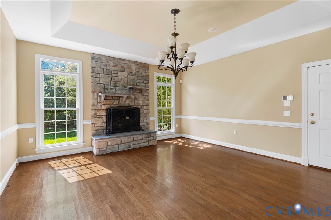 2365 State Rte 635 Midlothian, VA 23113 - Photo 60 of 64 Stone-clad fireplace, tray ceiling, hardwood floor