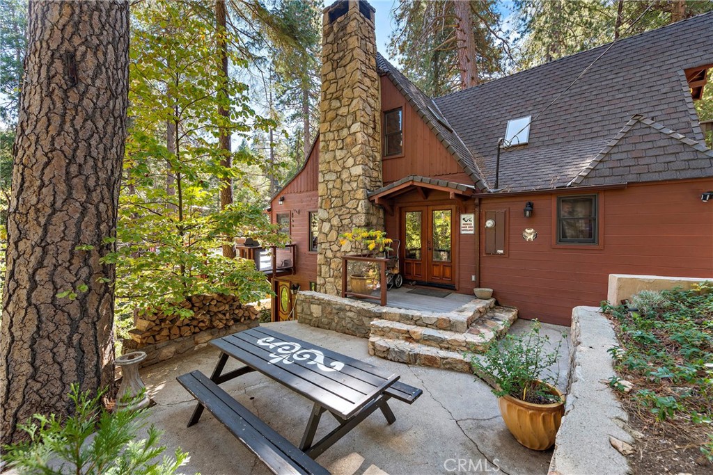 400 Cottage Grove Road Lake Arrowhead, CA 92352 - Photo 11 of 75 a view of backyard of the house
