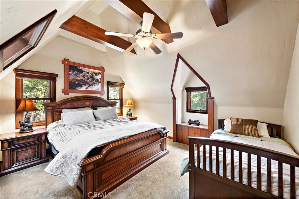 400 Cottage Grove Road Lake Arrowhead, CA 92352 - Photo 29 of 75 a bedroom with bed and a window