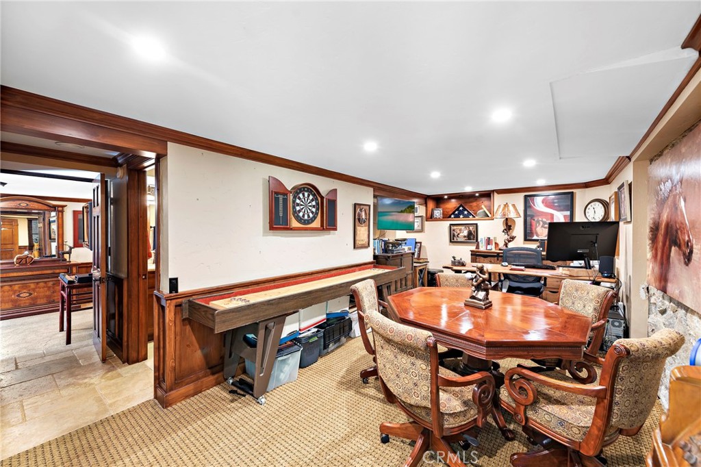 400 Cottage Grove Road Lake Arrowhead, CA 92352 - Photo 37 of 75 a outdoor dining space with furniture and a flat screen tv