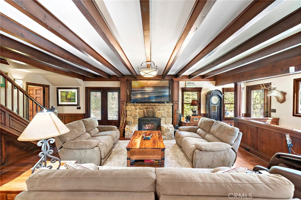 400 Cottage Grove Road Lake Arrowhead, CA 92352 - Photo 6 of 75 a living room with furniture fireplace and large windows