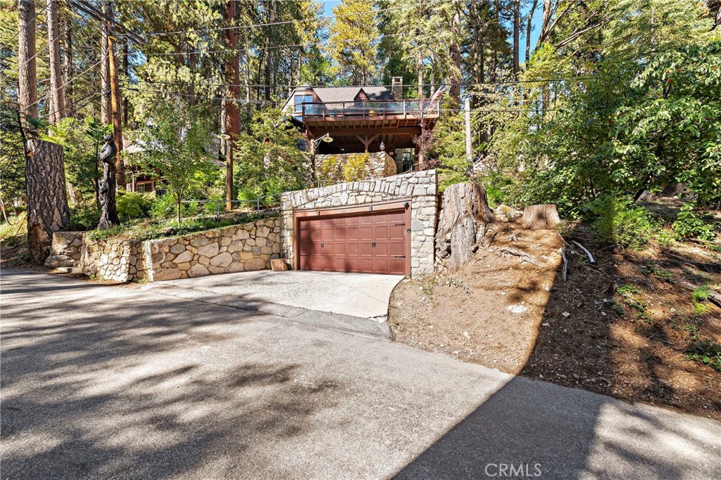 400 Cottage Grove Road Lake Arrowhead, CA 92352 - Photo 65 of 75 a view of a yard front of house with large trees