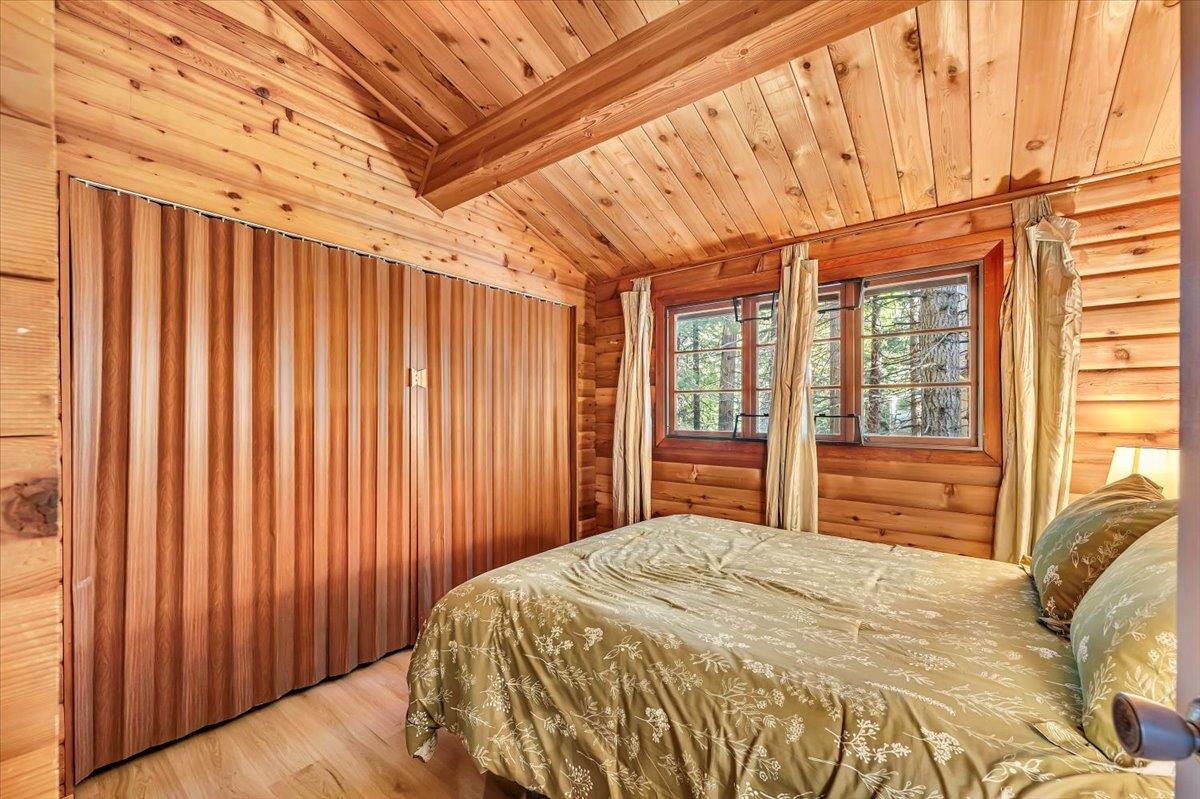 5520 Sacramento Avenue Homewood, CA 96141 - Photo 11 of 28 a bedroom with a bed and a window