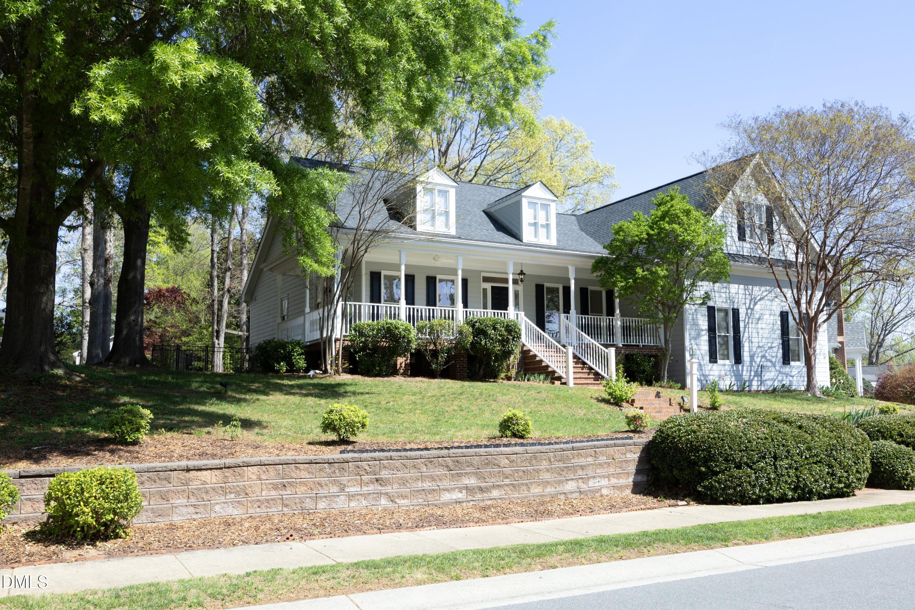 1427 Moosecreek Drive Raleigh, NC 27614 - Photo 2 of 48 a front view of a house with a yard