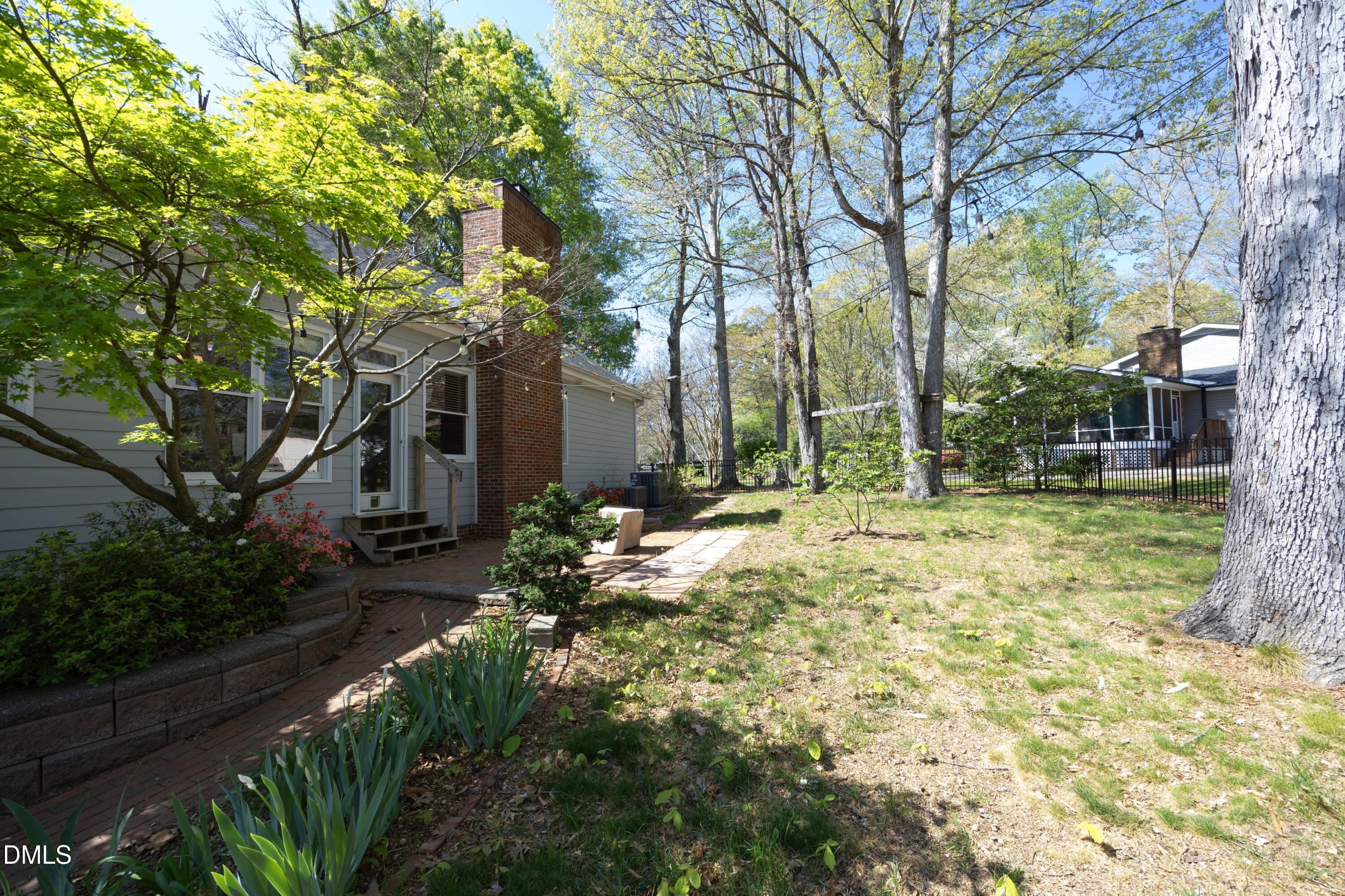1427 Moosecreek Drive Raleigh, NC 27614 - Photo 39 of 48 a backyard of a house with lots of green space