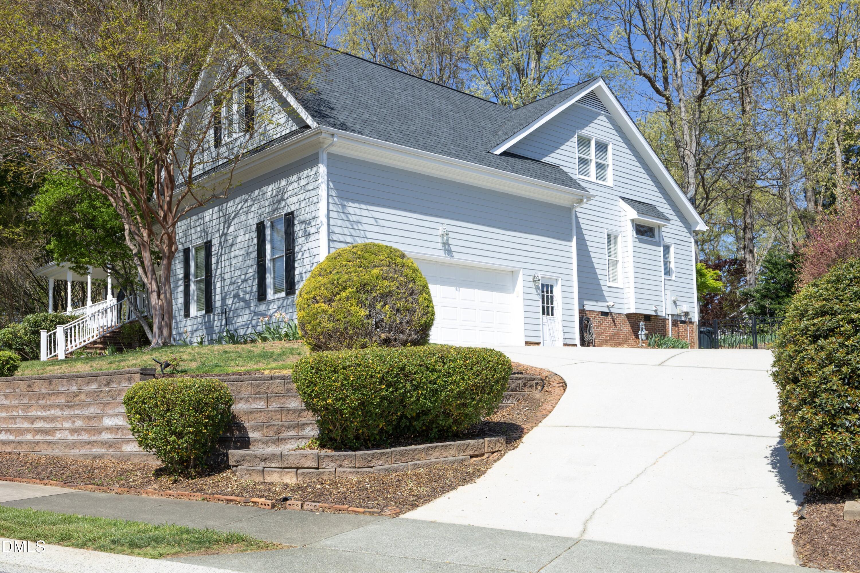 1427 Moosecreek Drive Raleigh, NC 27614 - Photo 3 of 48 a front view of a house with garden
