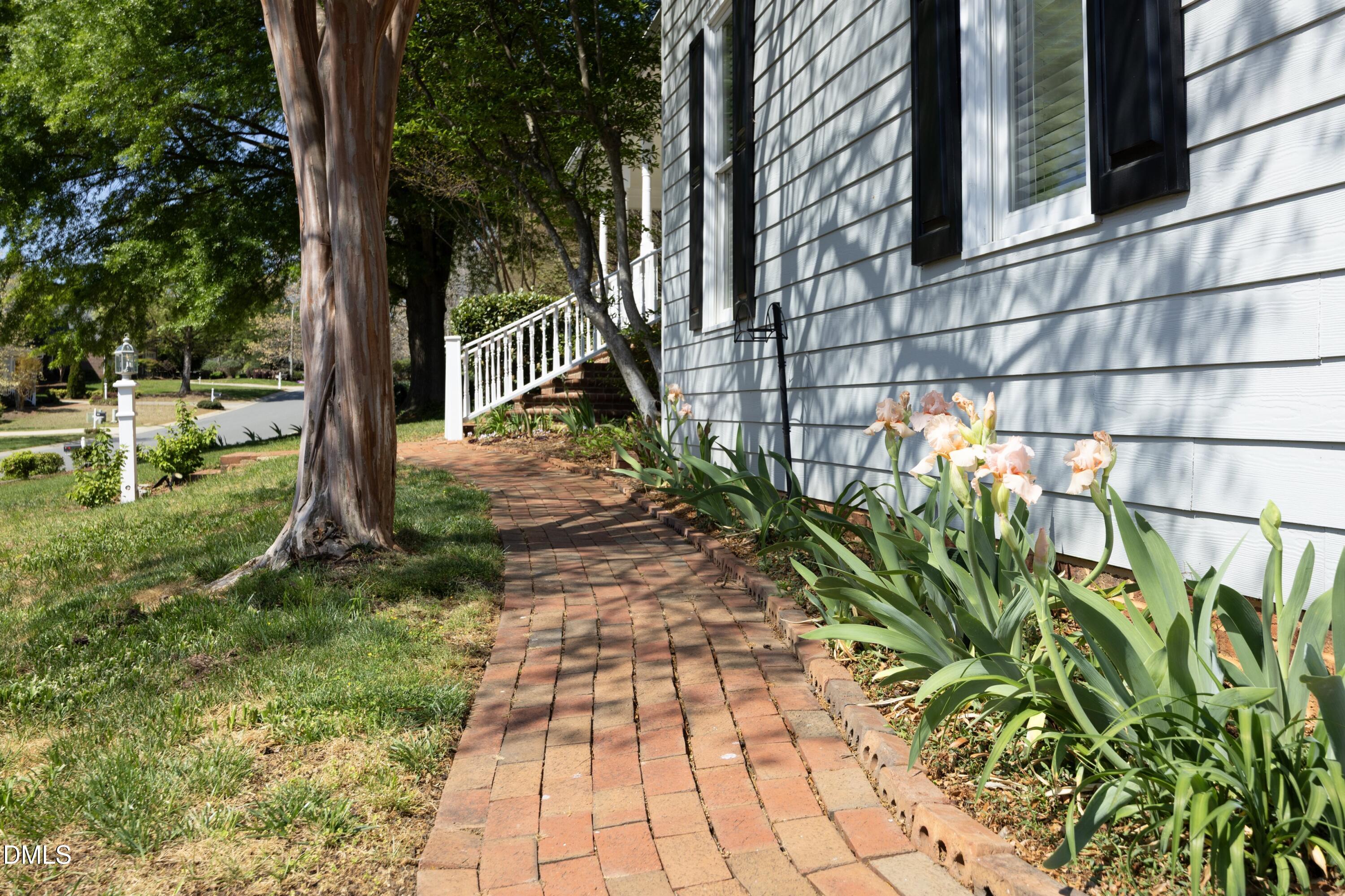 1427 Moosecreek Drive Raleigh, NC 27614 - Photo 6 of 48 a backyard of a house with lots of green space