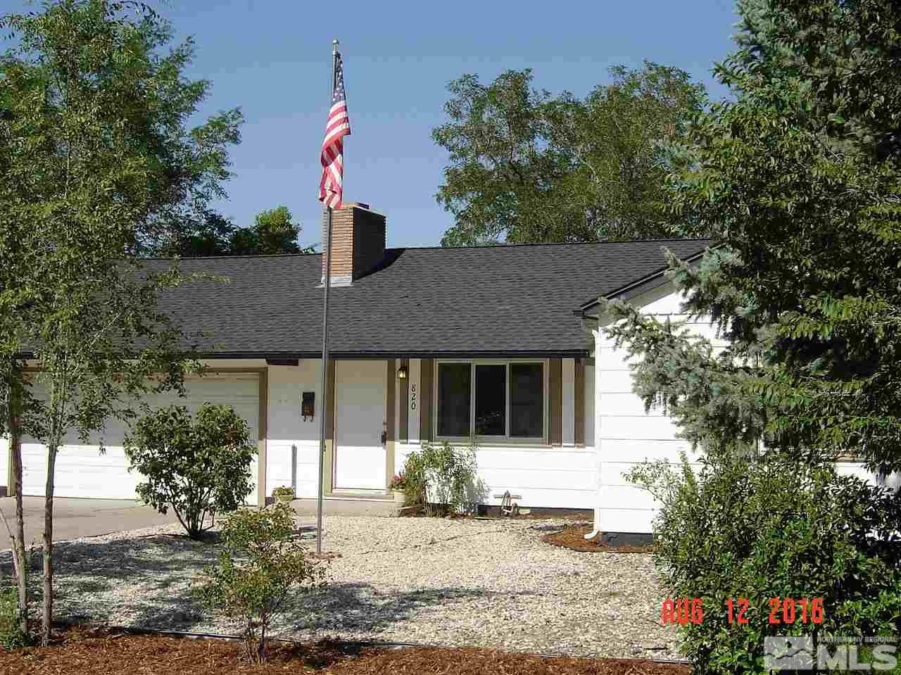 820 Mcdonald Reno, NV 89503 - Photo 1 of 1 a front view of a house with a yard
