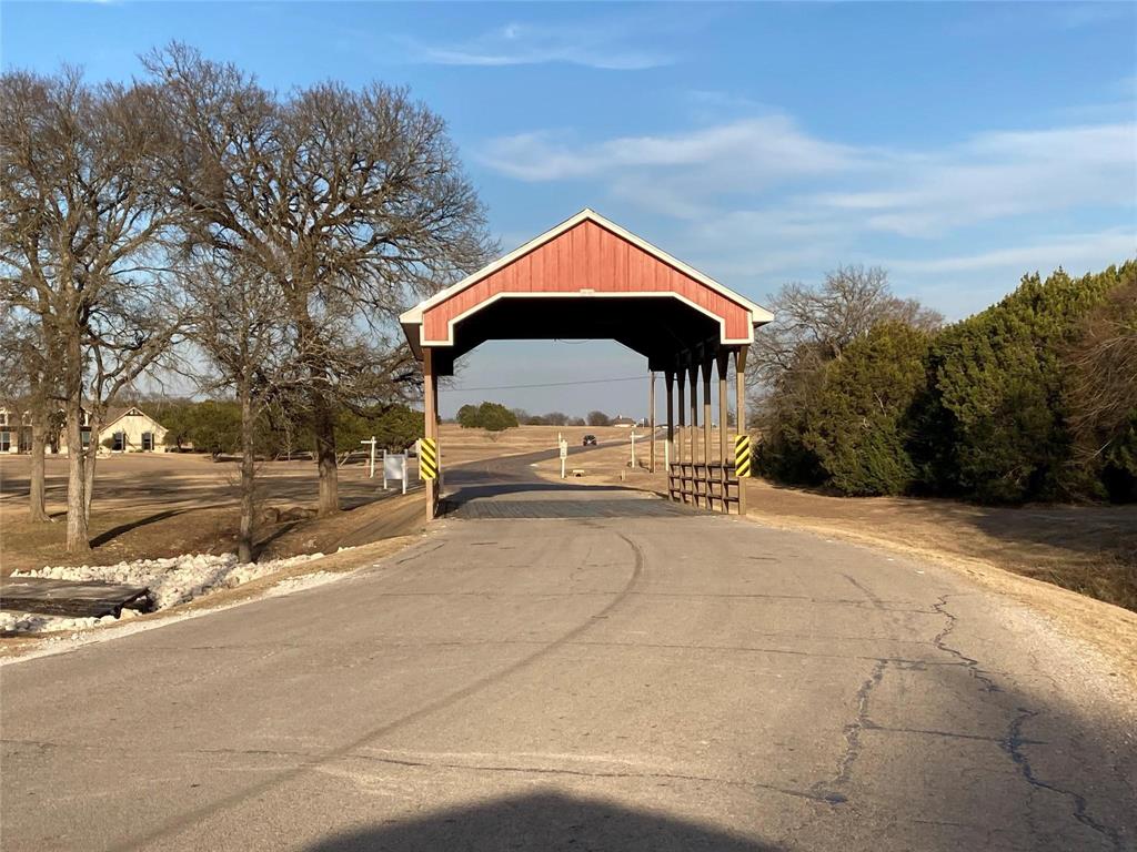 37056 Woodacre Road Whitney, TX 76692 - Photo 15 of 15 a view of a street with a building in the background