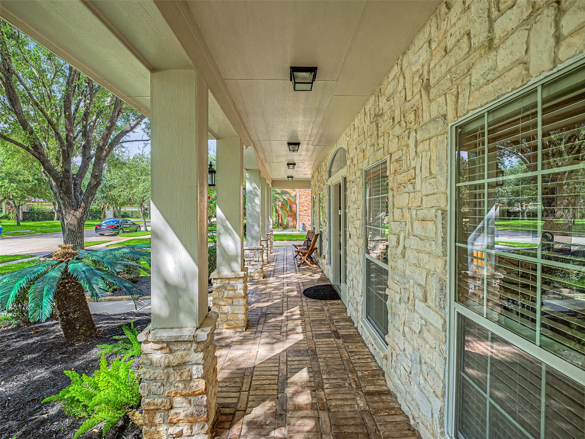 2210 Fox Path Katy, TX 77494 - Photo 5 of 47 Step onto this massive, deeply shaded front porch and instantly feel the stress of the day melt away.