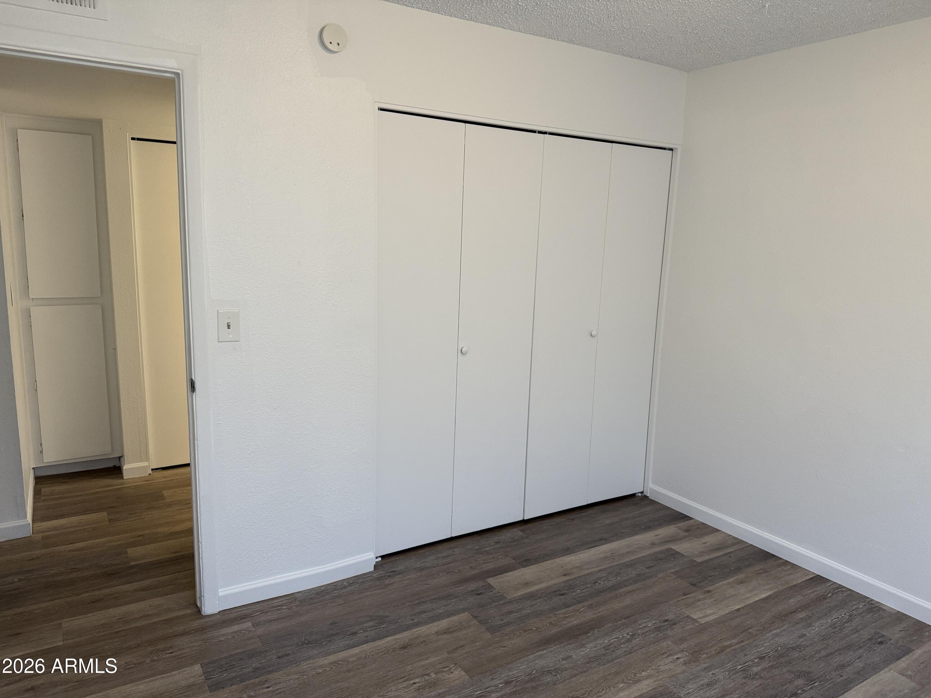 860 East Brown Road, Unit 53 Mesa, AZ 85203 - Photo 8 of 14 a view of an empty room