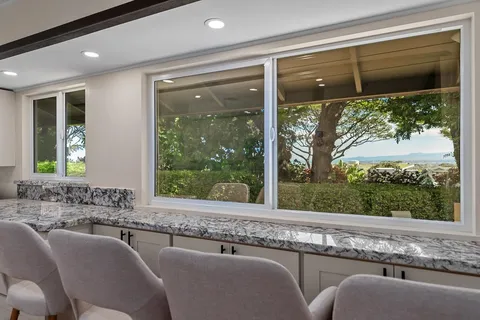 a kitchen with a sink stove and refrigerator