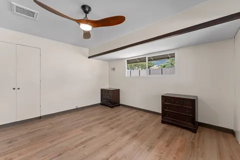 a bathroom with a granite countertop sink mirror and double