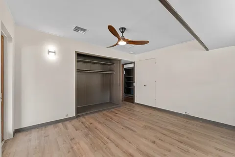 a view of cabinets with sink