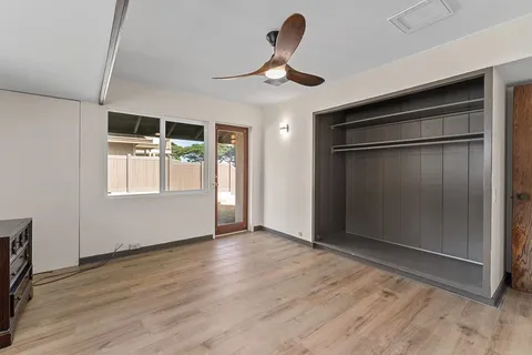 a view of lake from under an umbrella
