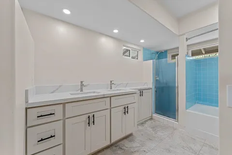 a view of a house with a yard and garage