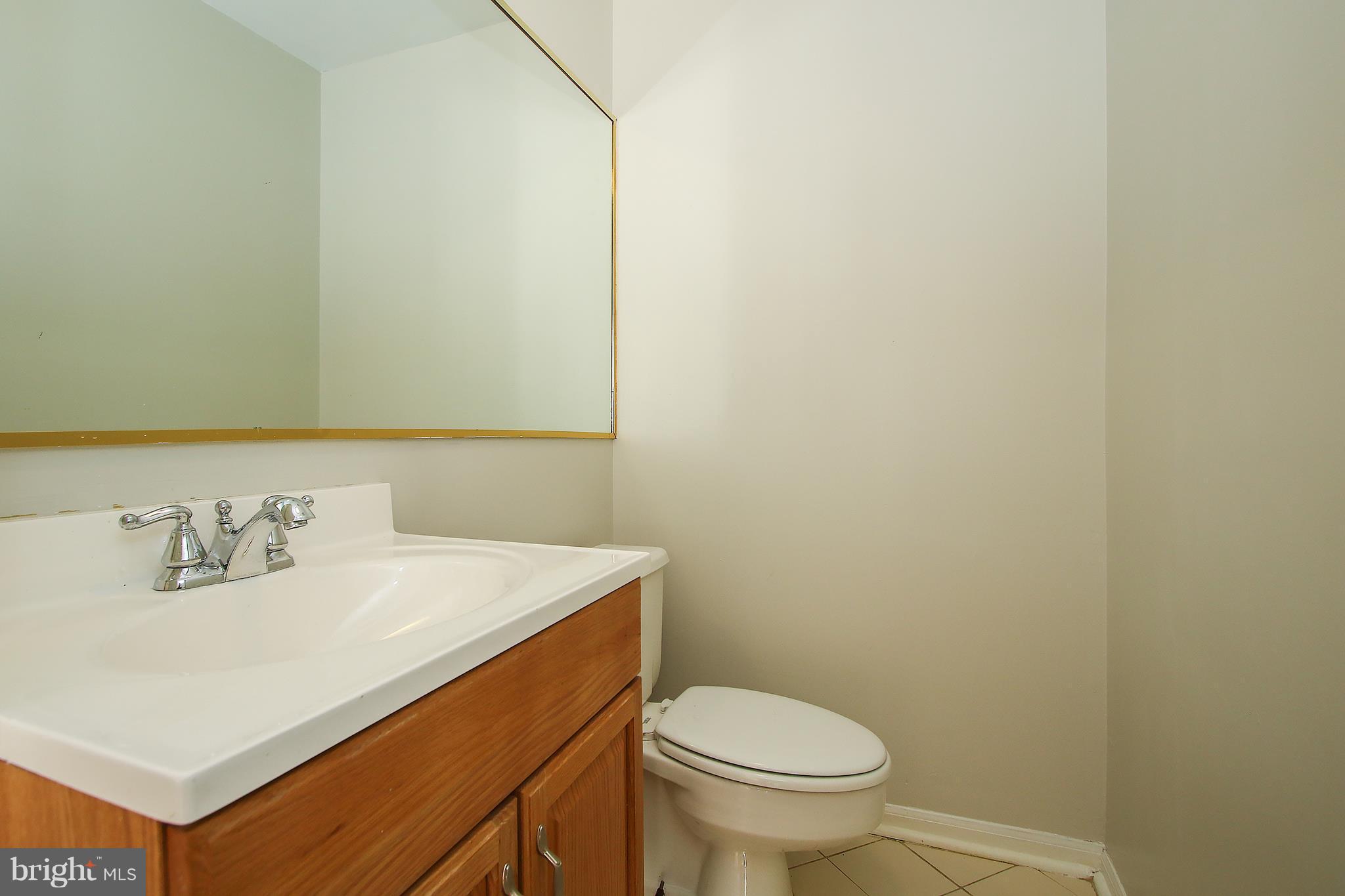 428 Legato Terrace Silver Spring, MD 20901 - Photo 8 of 14 Main level half bathroom.