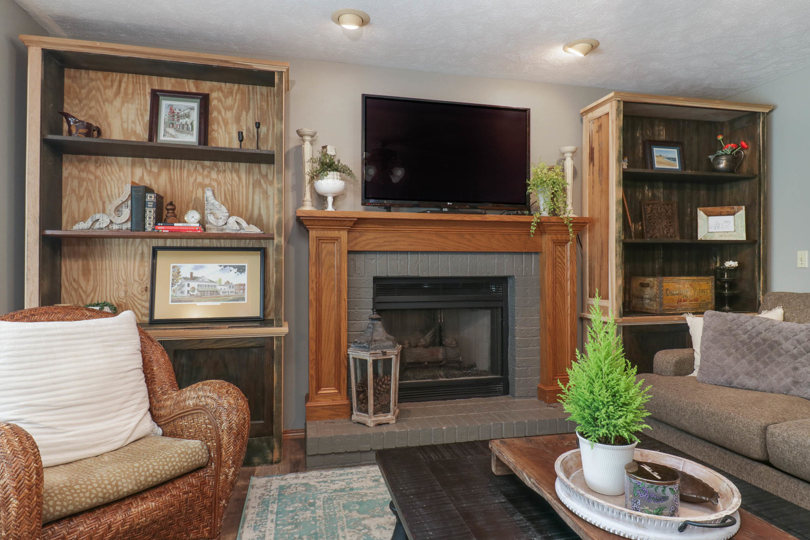 3203 Eagle Crest Road Bloomington, IL 61704 - Photo 6 of 52 a living room with furniture and a flat screen tv
