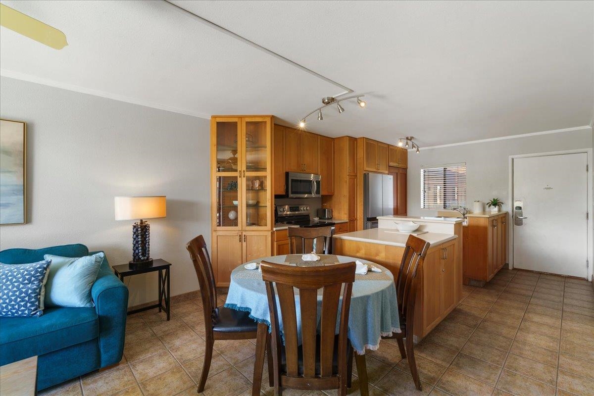 2219 South Kihei Road, Unit B414 Kihei, HI 96753 - Photo 12 of 42 a view of a dining room with furniture