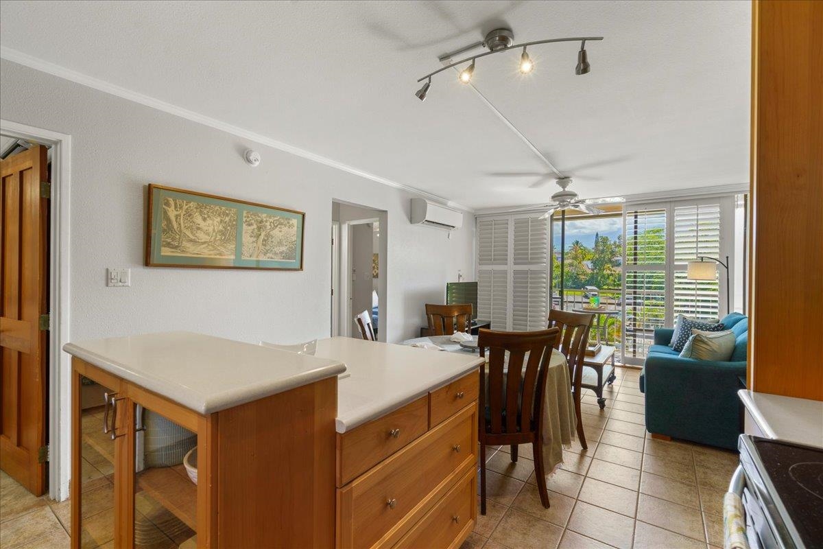 2219 South Kihei Road, Unit B414 Kihei, HI 96753 - Photo 24 of 42 a view of a dining room with furniture window and outside view