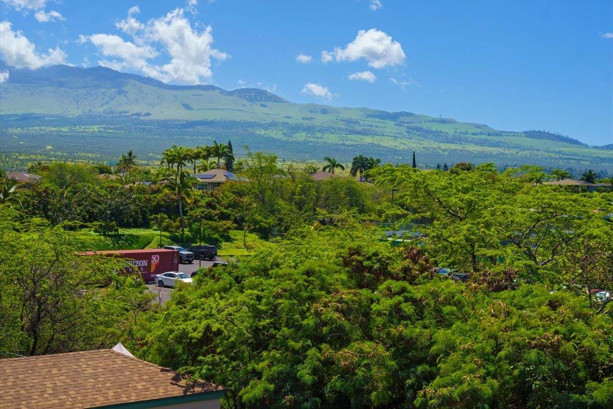 2219 South Kihei Road, Unit B414 Kihei, HI 96753 - Photo 32 of 42 a view of a lake with a yard