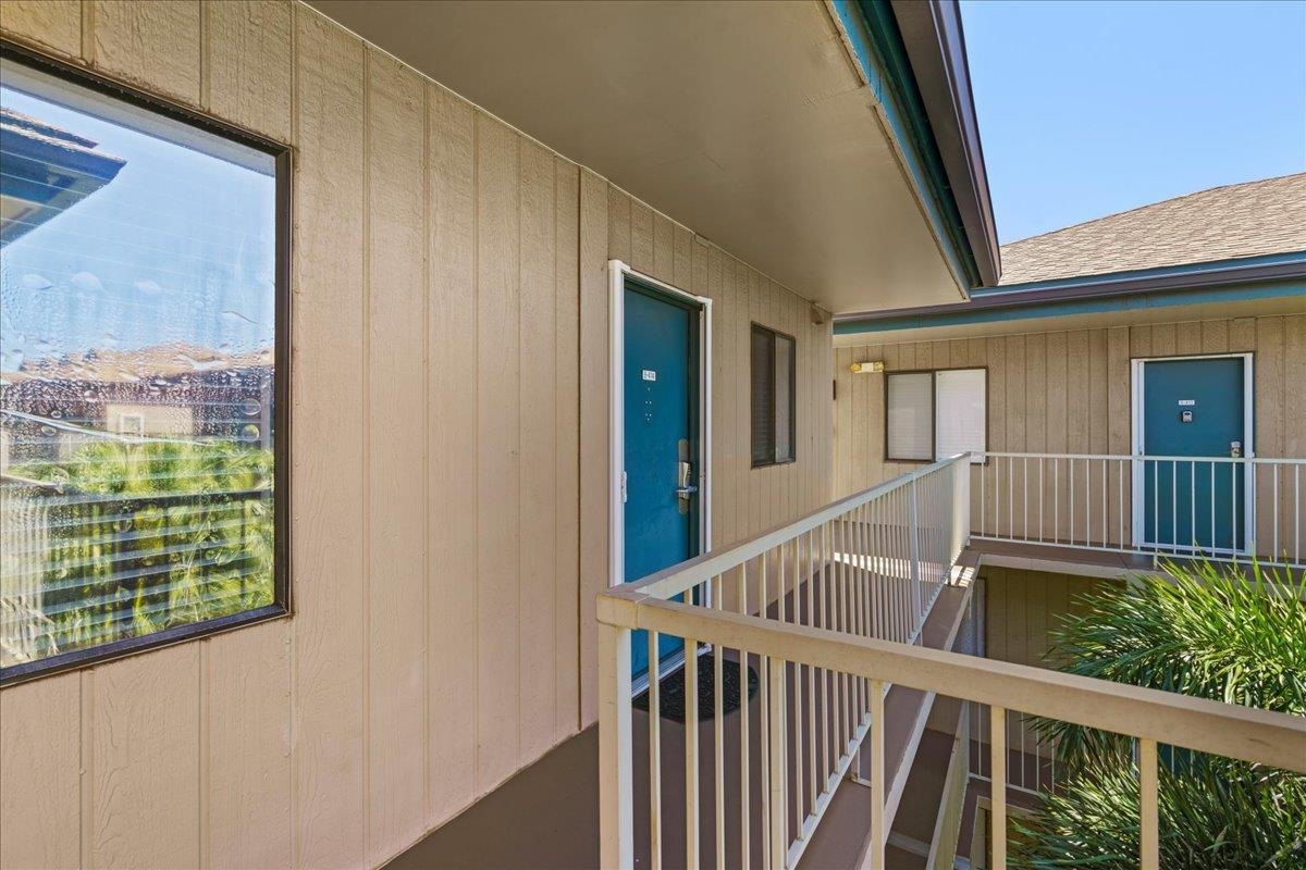 2219 South Kihei Road, Unit B414 Kihei, HI 96753 - Photo 34 of 42 a view of staircase with railing and wooden floor