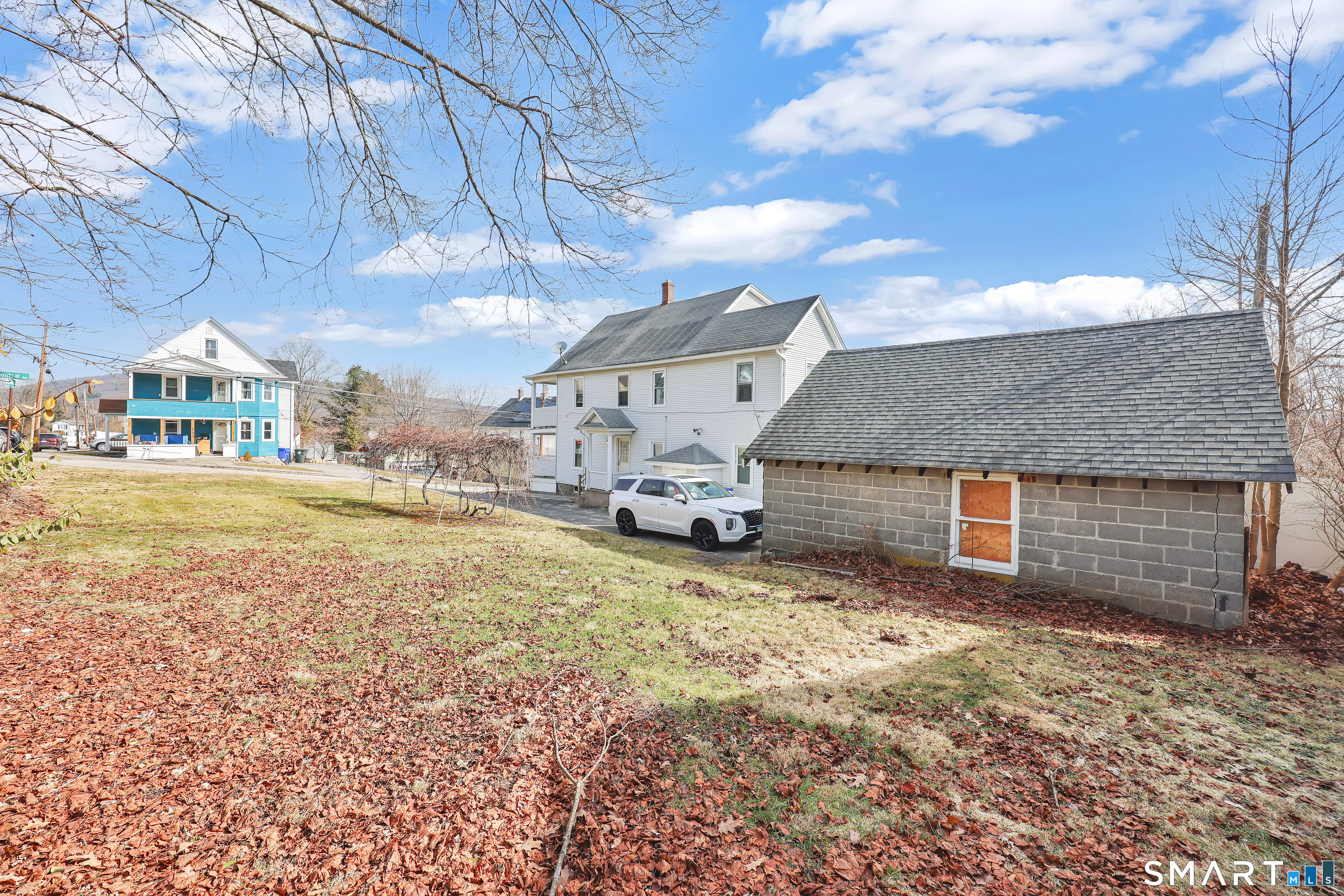 169 Central Avenue Torrington, CT 06790 - Photo 11 of 31 a front view of a house with a yard