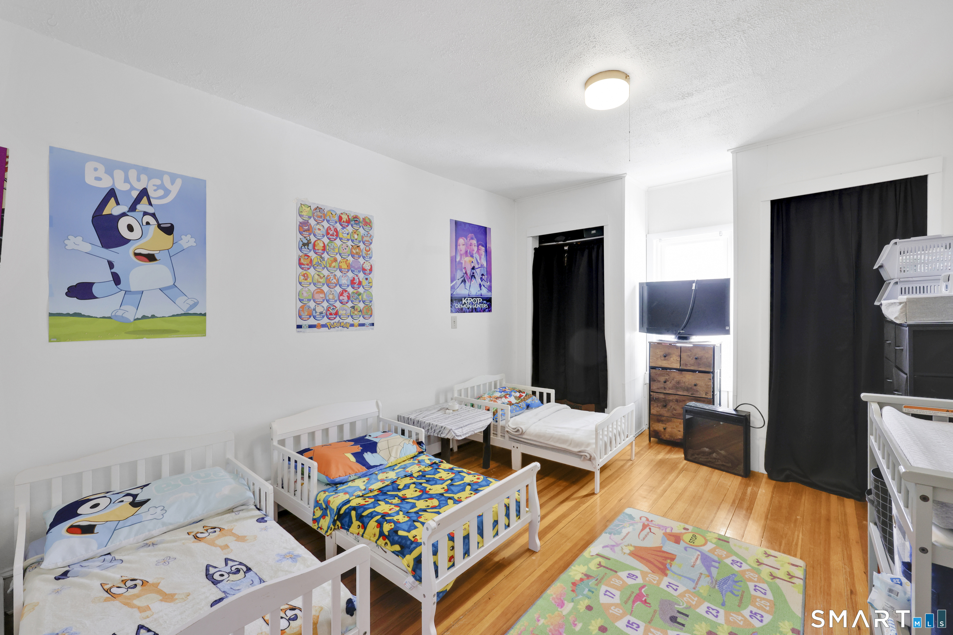 169 Central Avenue Torrington, CT 06790 - Photo 15 of 31 a bedroom with furniture and a bed