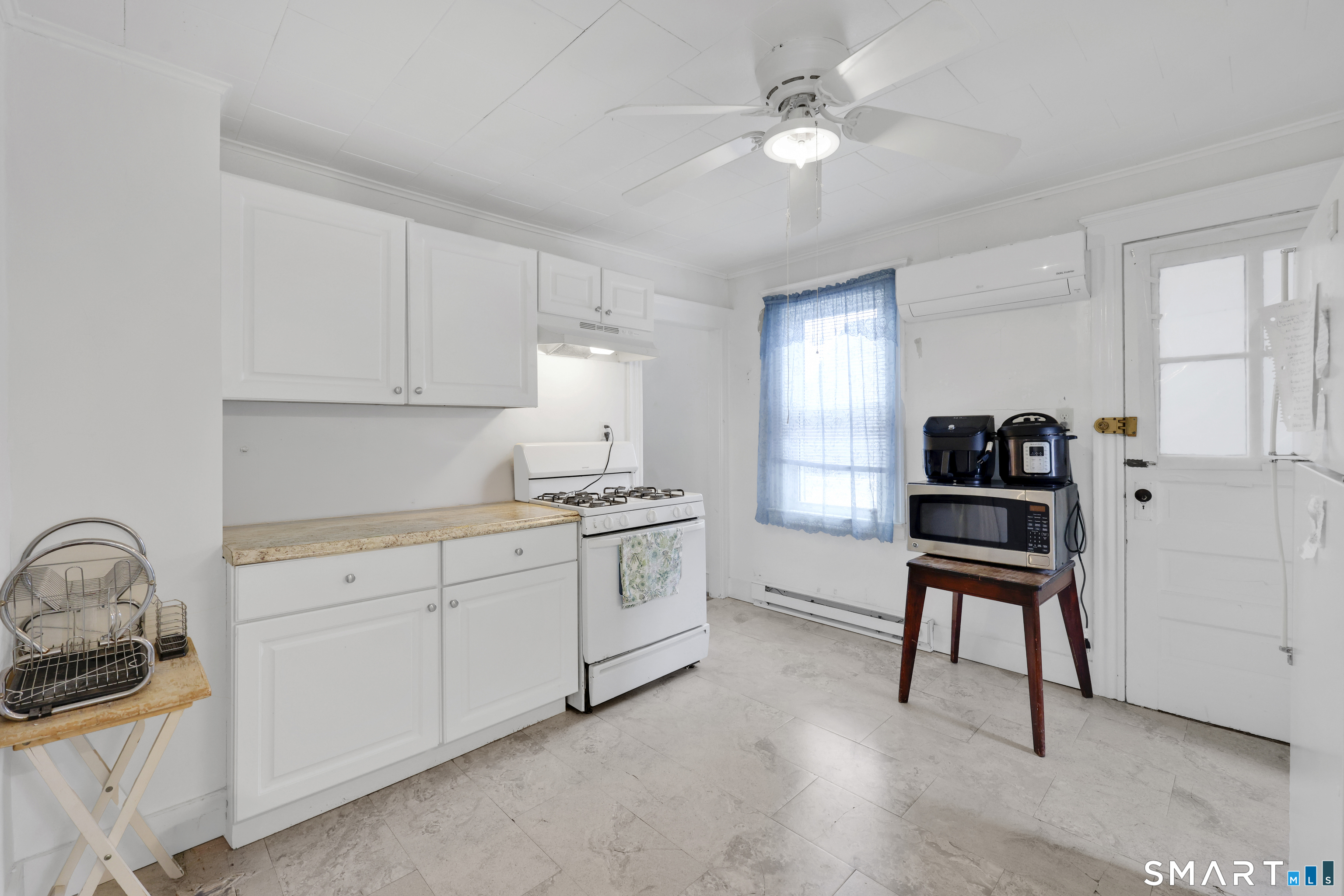 169 Central Avenue Torrington, CT 06790 - Photo 23 of 31 a kitchen with a sink cabinets and window