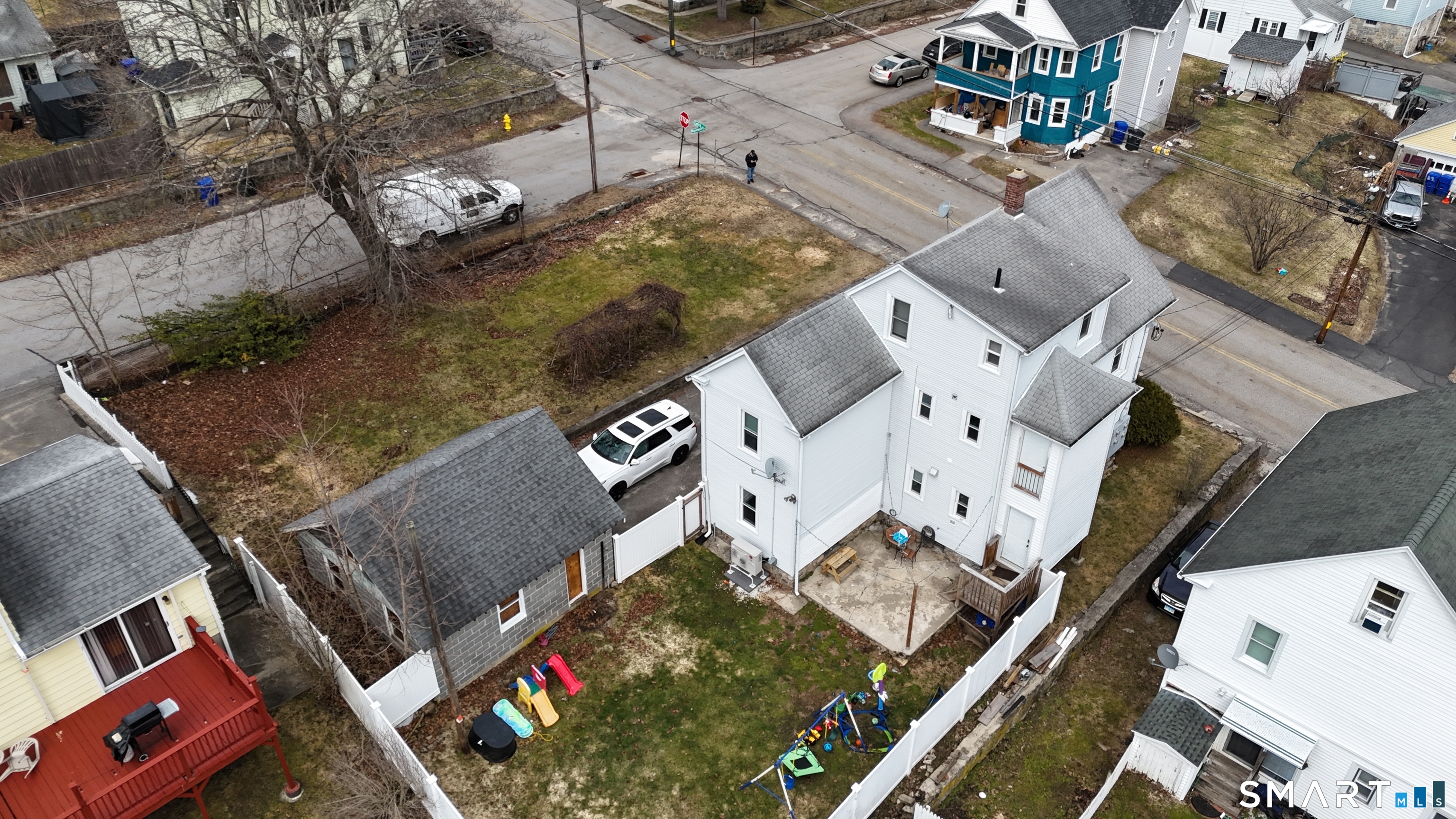 169 Central Avenue Torrington, CT 06790 - Photo 8 of 31 an aerial view of residential houses with outdoor space