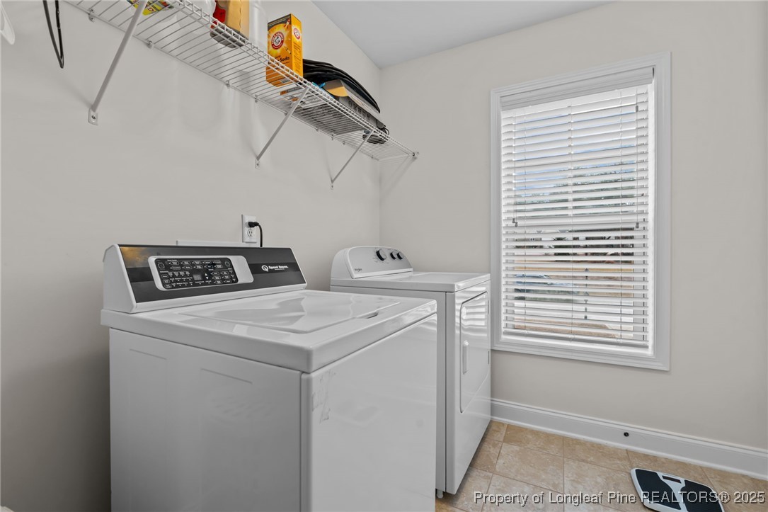 182 Valley Stream Road Spring Lake, NC 28390 - Photo 11 of 26 a utility room with dryer and washer
