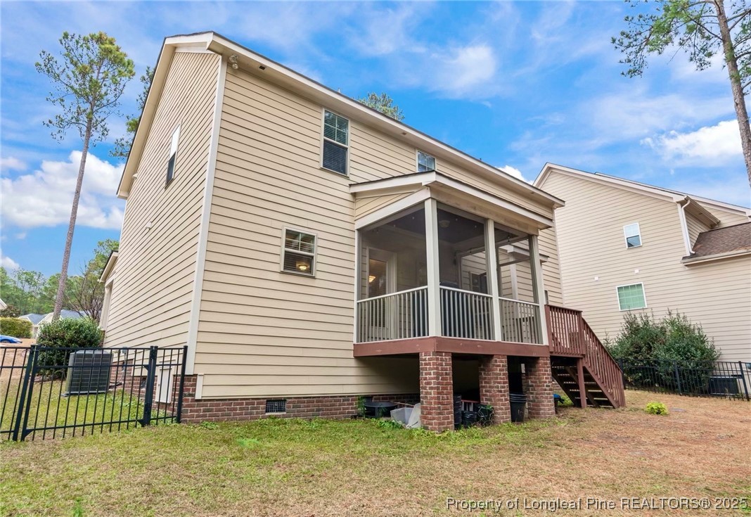 182 Valley Stream Road Spring Lake, NC 28390 - Photo 21 of 26 a view of a house with a yard
