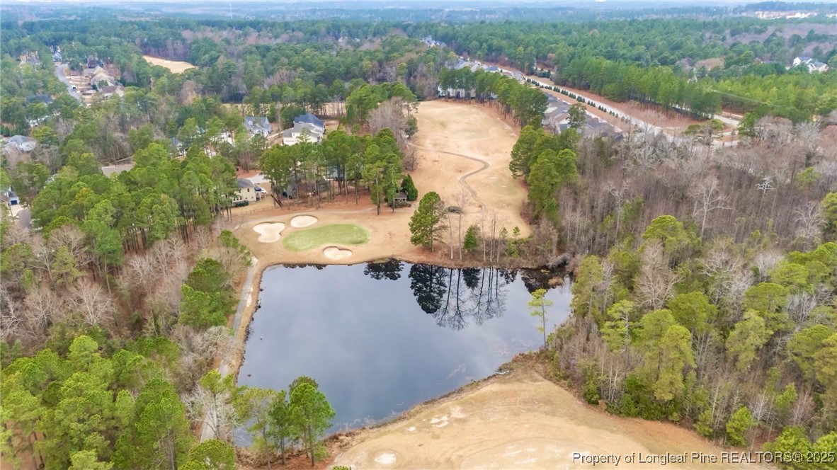 182 Valley Stream Road Spring Lake, NC 28390 - Photo 22 of 26 an aerial view of a house with a yard and lake view