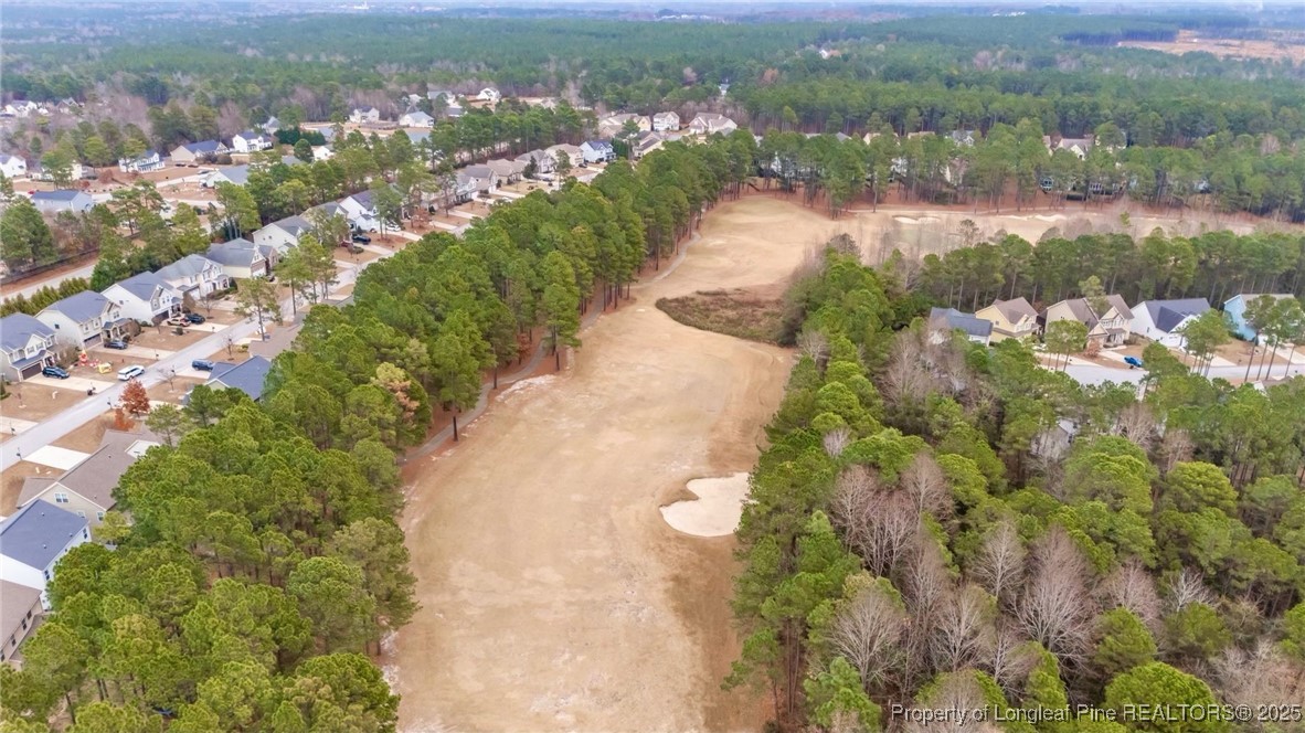 182 Valley Stream Road Spring Lake, NC 28390 - Photo 26 of 26 a view of a lake with a city