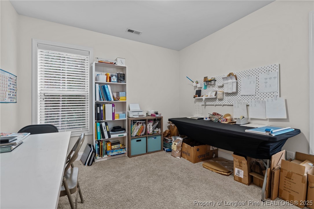 182 Valley Stream Road Spring Lake, NC 28390 - Photo 10 of 26 a view of a workspace with furniture