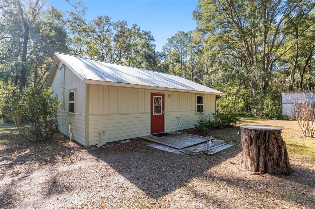 18124 Southwest 75 Avenue Archer, FL 32618 - Photo 25 of 52 a house with a outdoor space
