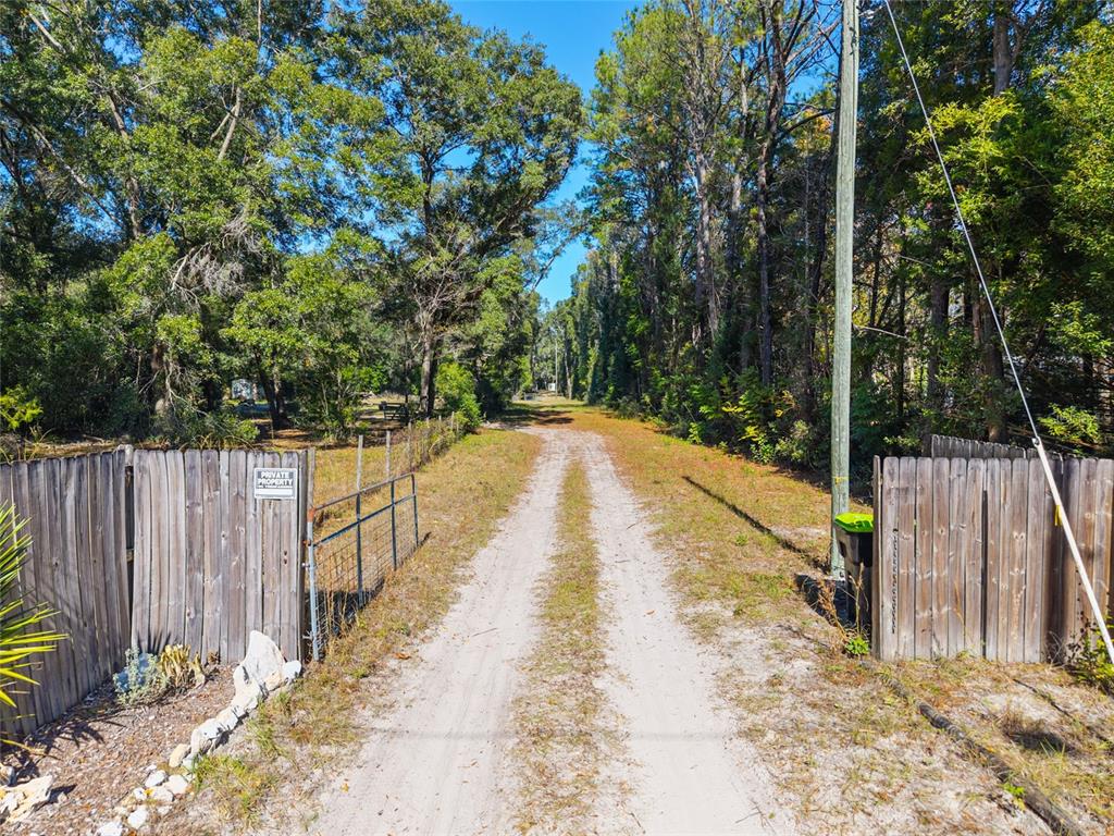 18124 Southwest 75 Avenue Archer, FL 32618 - Photo 29 of 52 a view of swimming pool with a patio
