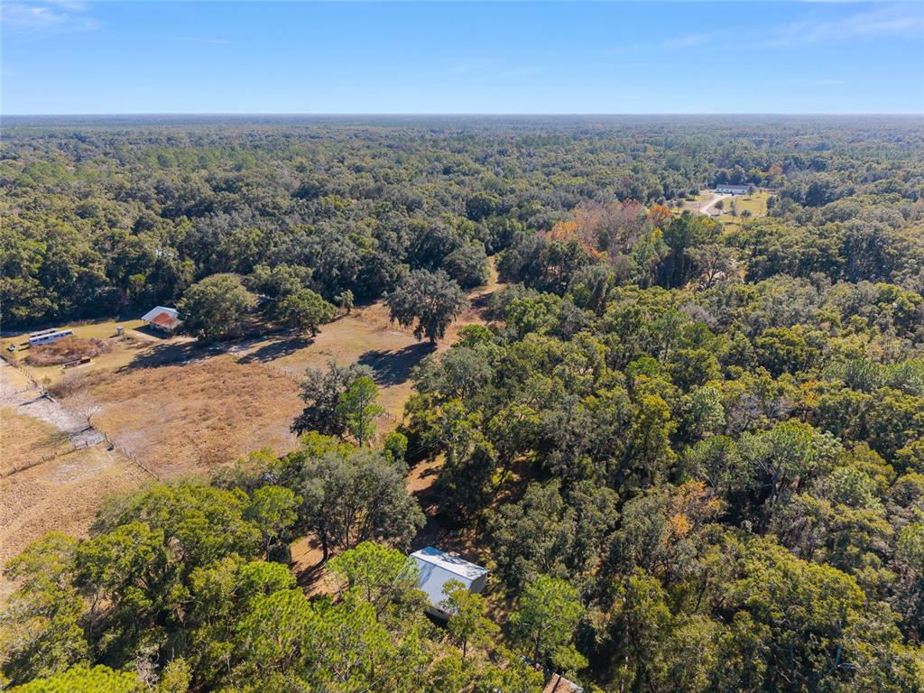 18124 Southwest 75 Avenue Archer, FL 32618 - Photo 37 of 52 an aerial view of residential houses with outdoor space