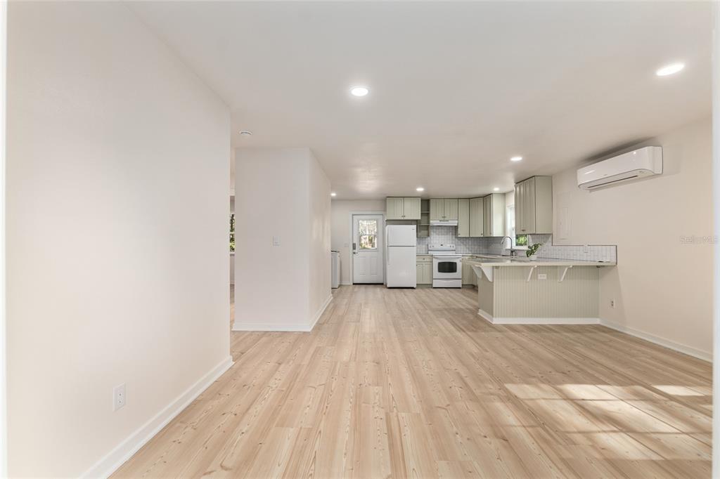 18124 Southwest 75 Avenue Archer, FL 32618 - Photo 7 of 52 a view of kitchen with wooden floor