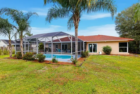 a view of a house with a swimming pool