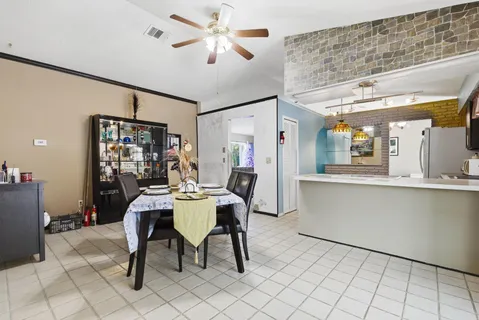 a view of a dining room with furniture