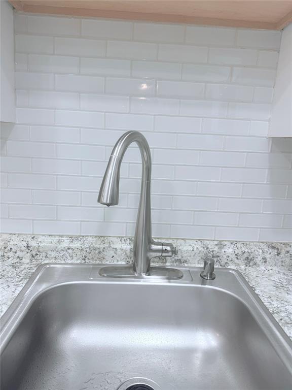 251 South Cypress Road, Unit 120 Pompano Beach, FL 33060 - Photo 11 of 42 a close view of sink and tap
