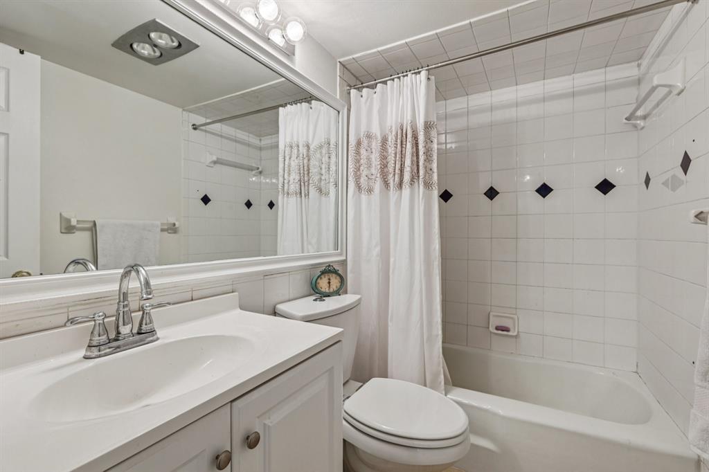 251 South Cypress Road, Unit 120 Pompano Beach, FL 33060 - Photo 13 of 42 a bathroom with a sink a toilet and shower